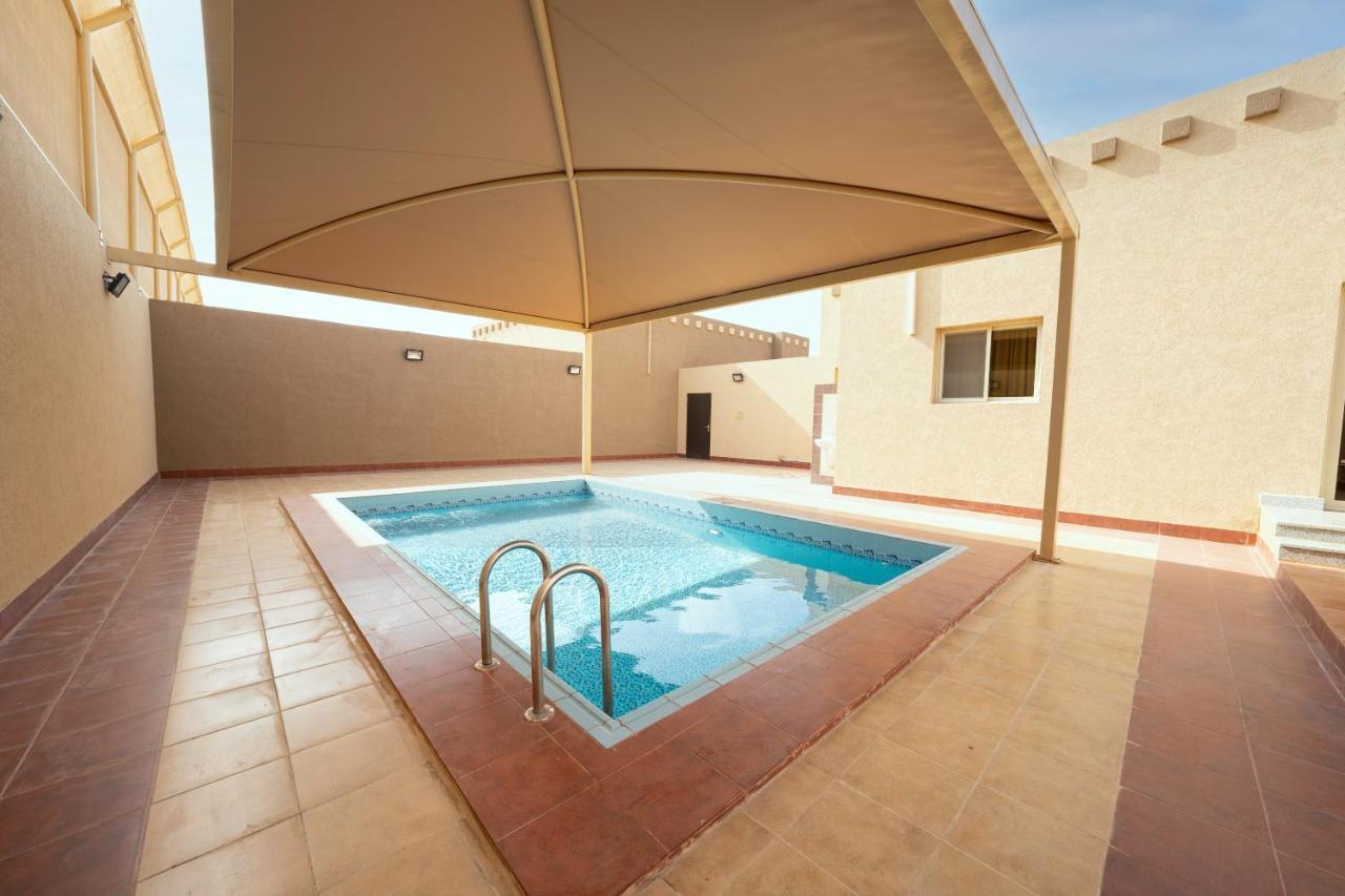 Mirada Gold Jizan - Resort & Private Pools Dış mekan fotoğraf A swimming pool in Al-Shaqra, Saudi Arabia